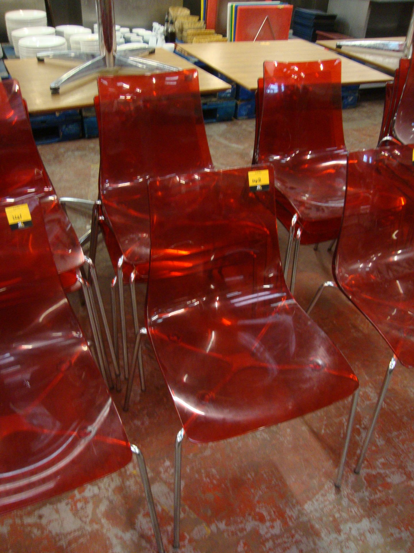 4 off matching red clear plastic chairs on metal legs. NB lots 138 - 145 consist of different