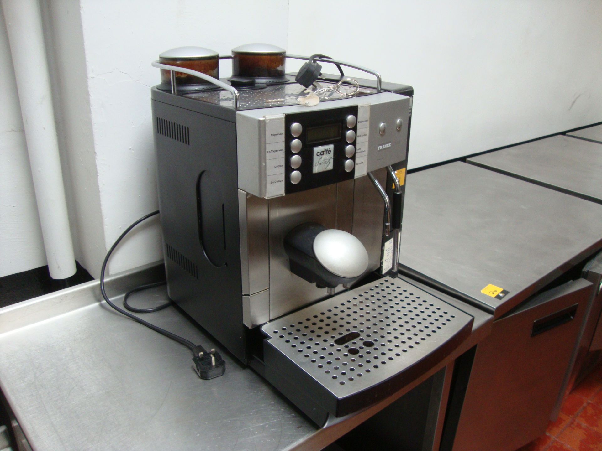 Franke commercial bean to cup coffee machine with twin coffee bean compartments, cup warming system,