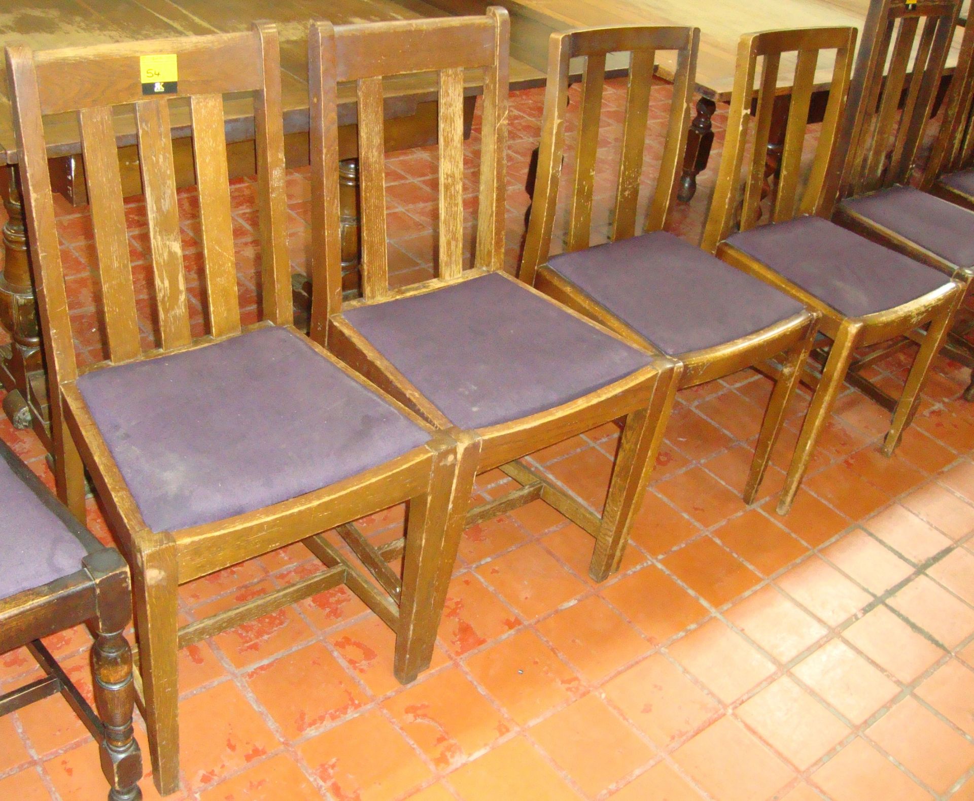 4 off wooden chairs with purple upholstered seat bases. NB each chair is slightly different
