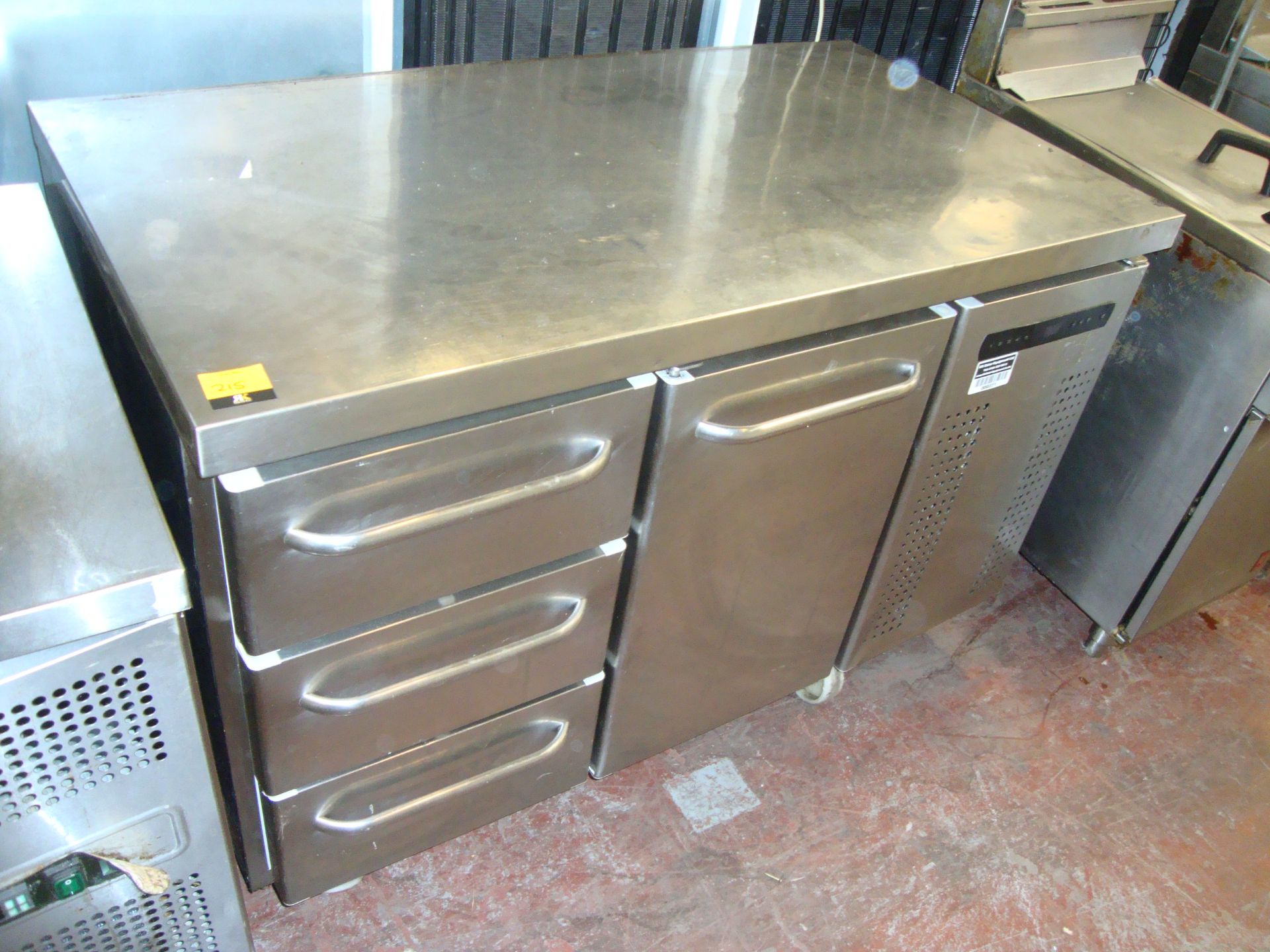 Stainless steel mobile refrigerated prep unit with slide out refrigerated drawers plus cupboard