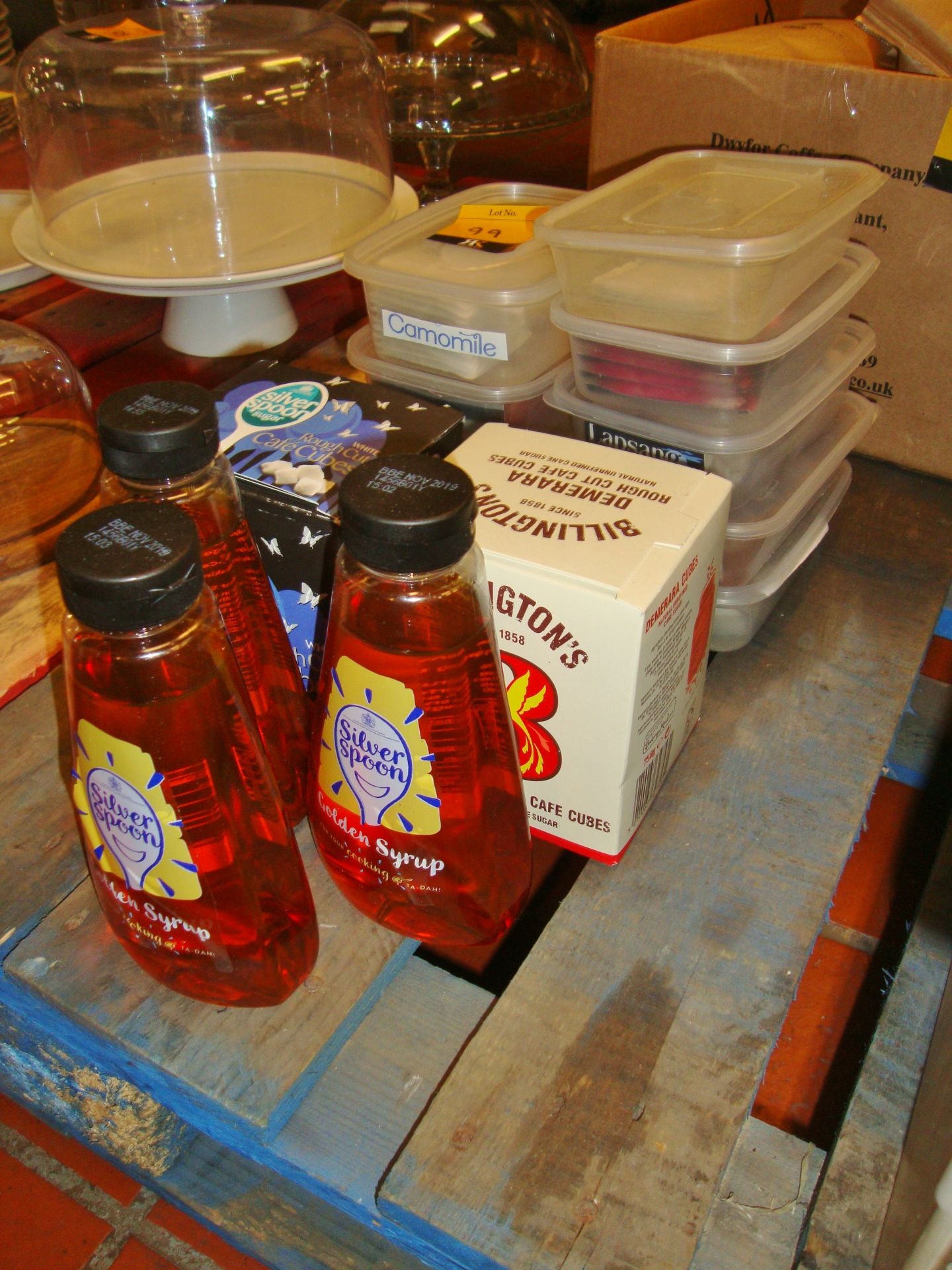 Row of assorted syrup, sugar & teabags