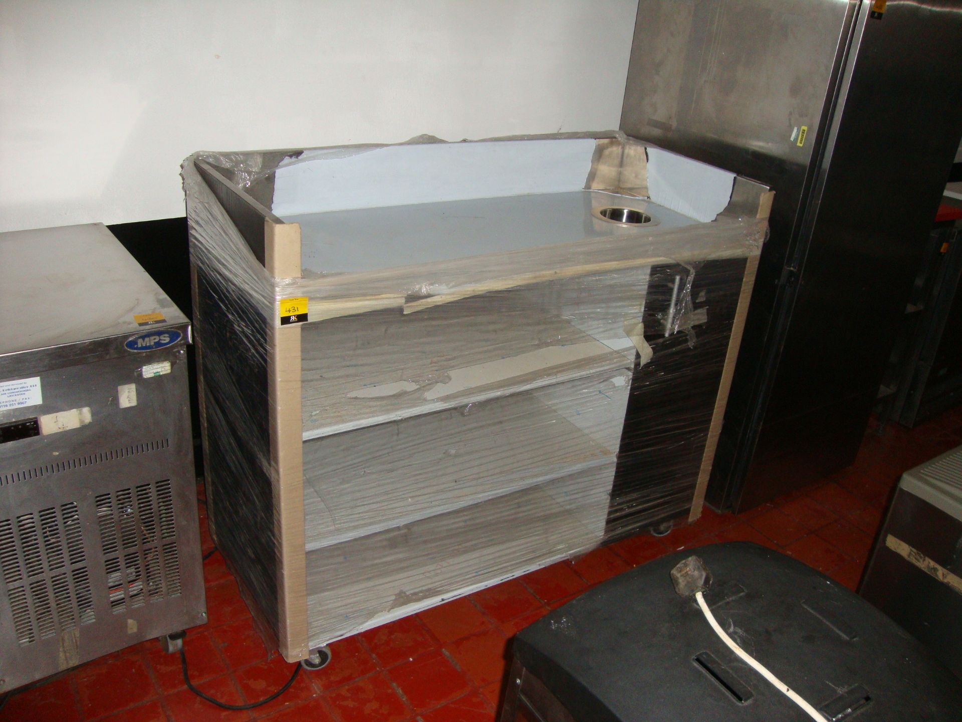 Stainless steel shelving unit on wheels, with black exterior side panels