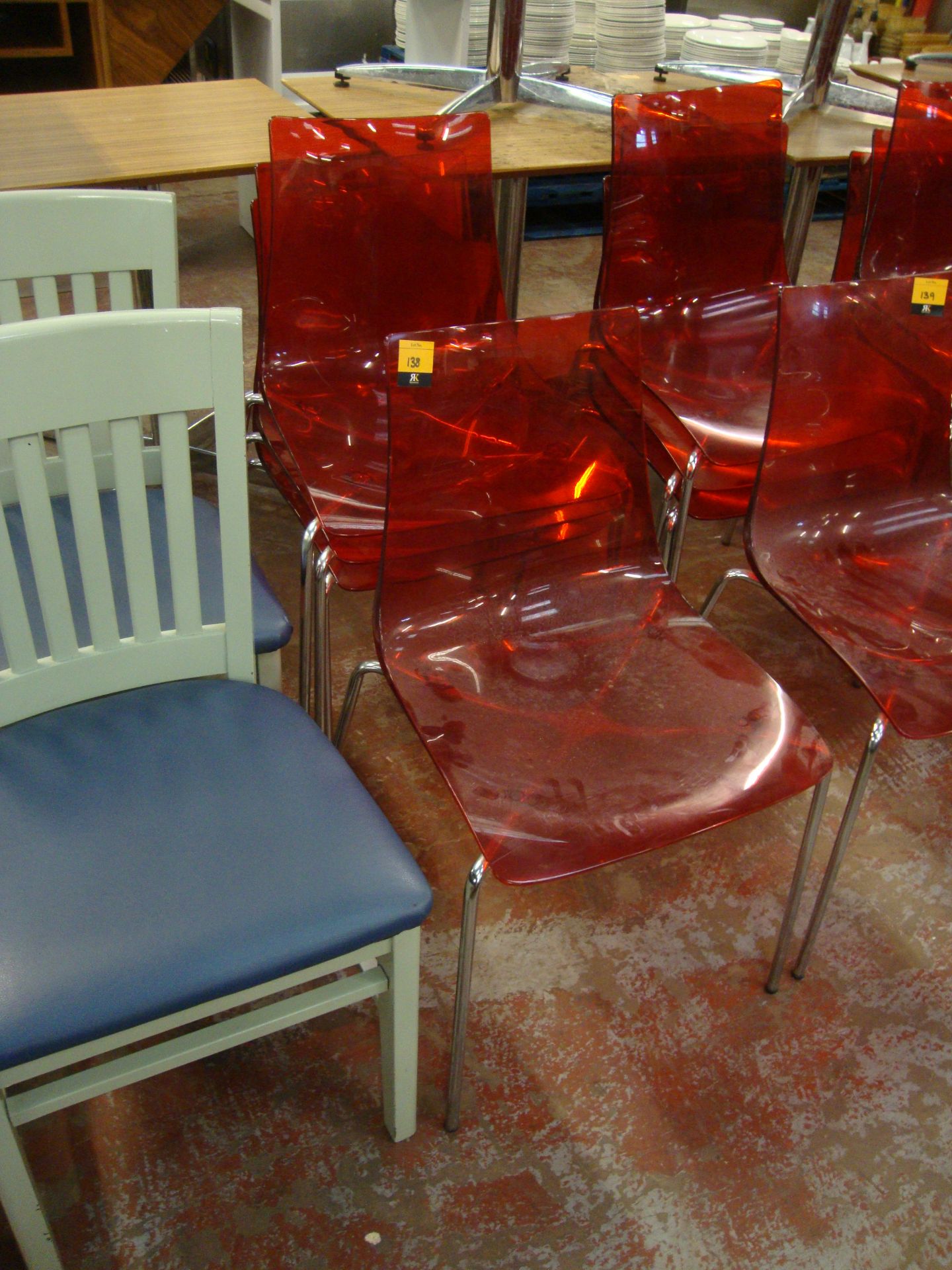 4 off matching red clear plastic chairs on metal legs. NB lots 138 - 145 consist of different