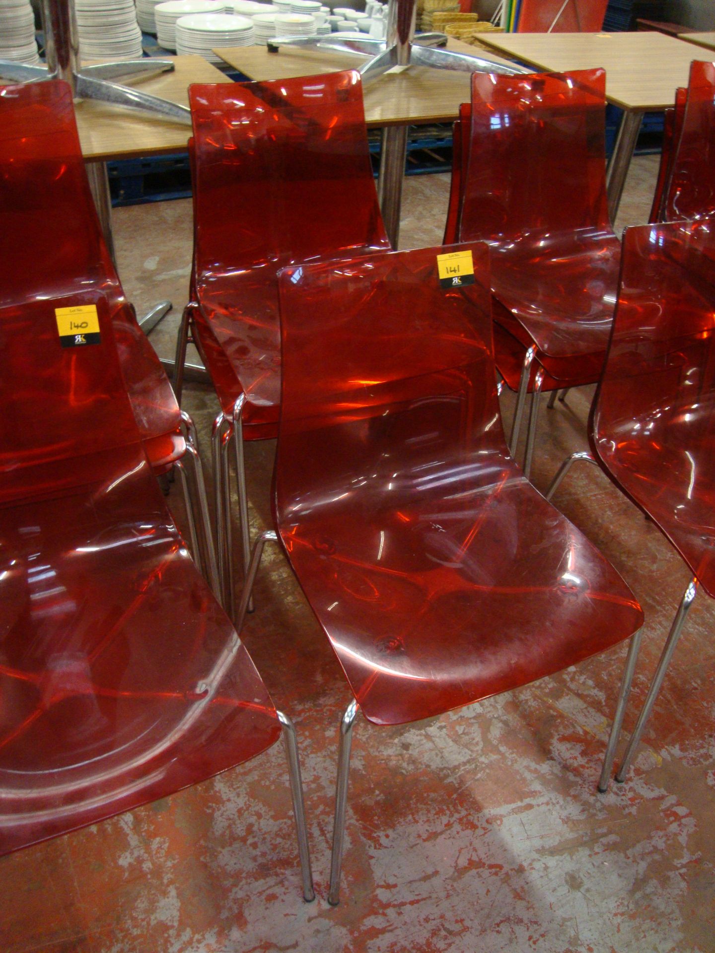 4 off matching red clear plastic chairs on metal legs. NB lots 138 - 145 consist of different