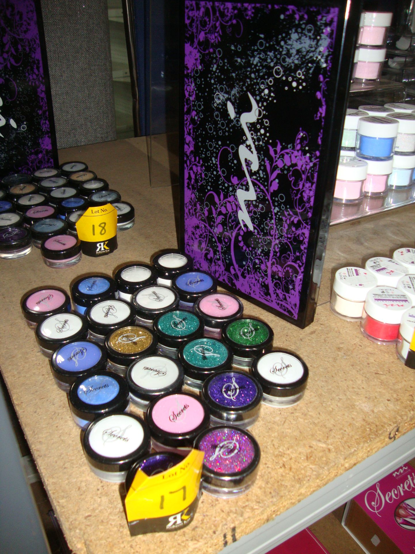 22 off 5gr tubs of Secrets by NSI Assorted Glitters. This lot includes a travel box capable of