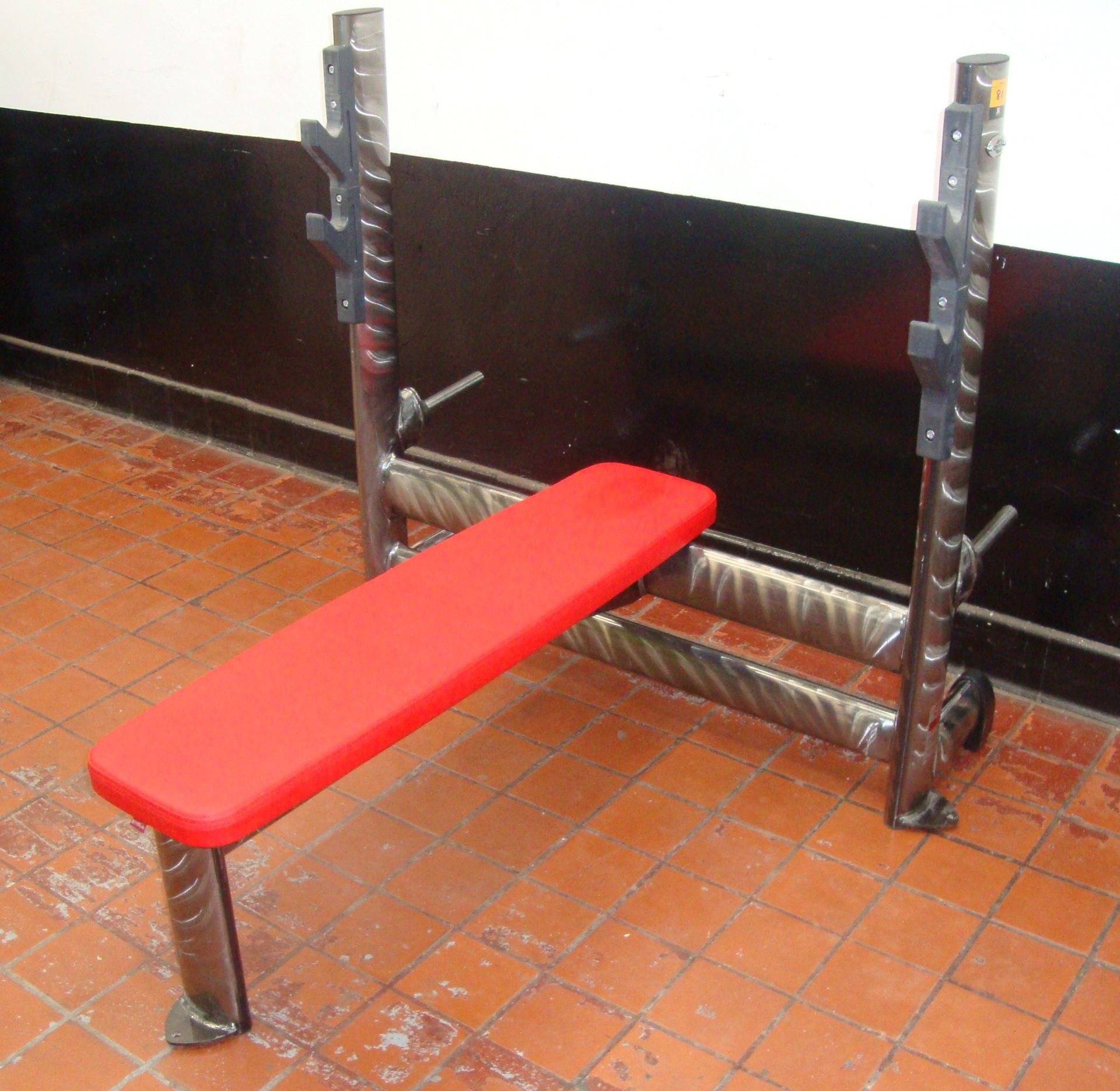 Gym 80 Sygnum press bench, with silver frame & red upholstery, understood to have been purchased new