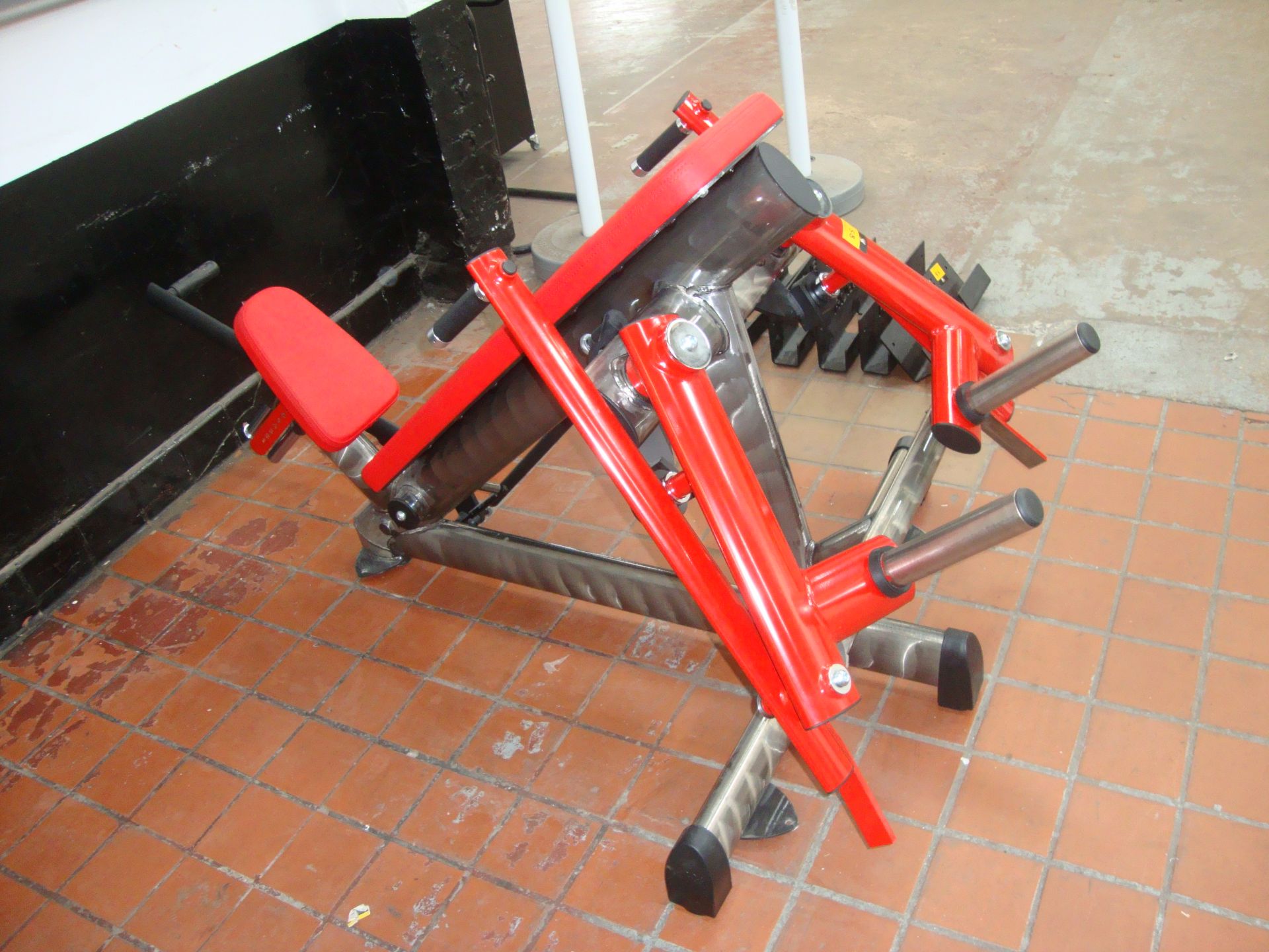 Gym 80 Sygnum Pure Kraft butterfly plate loaded machine, with silver/red frame & red upholstery,