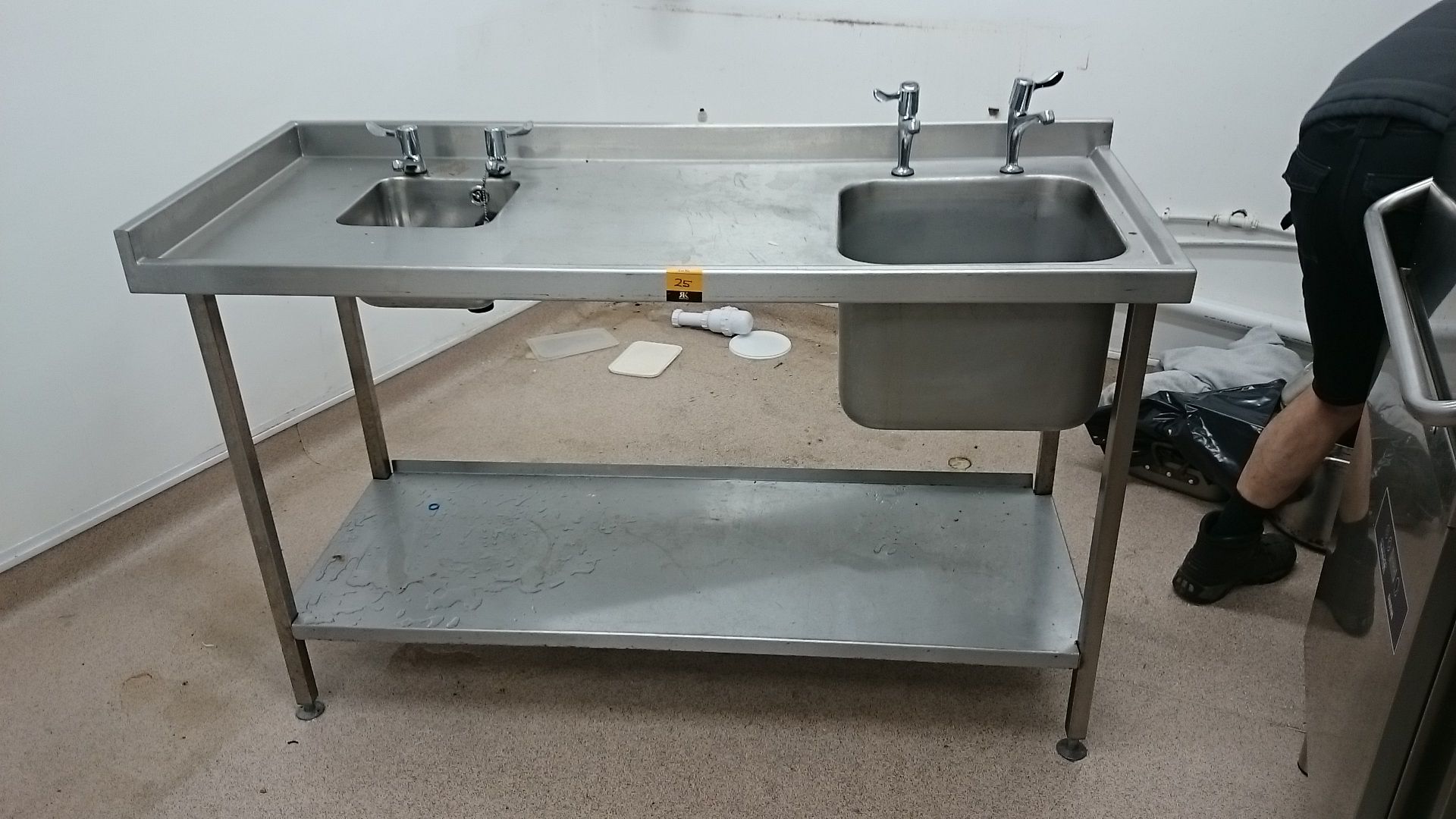 stainless steel sink unit complete with hand wash basin and taps