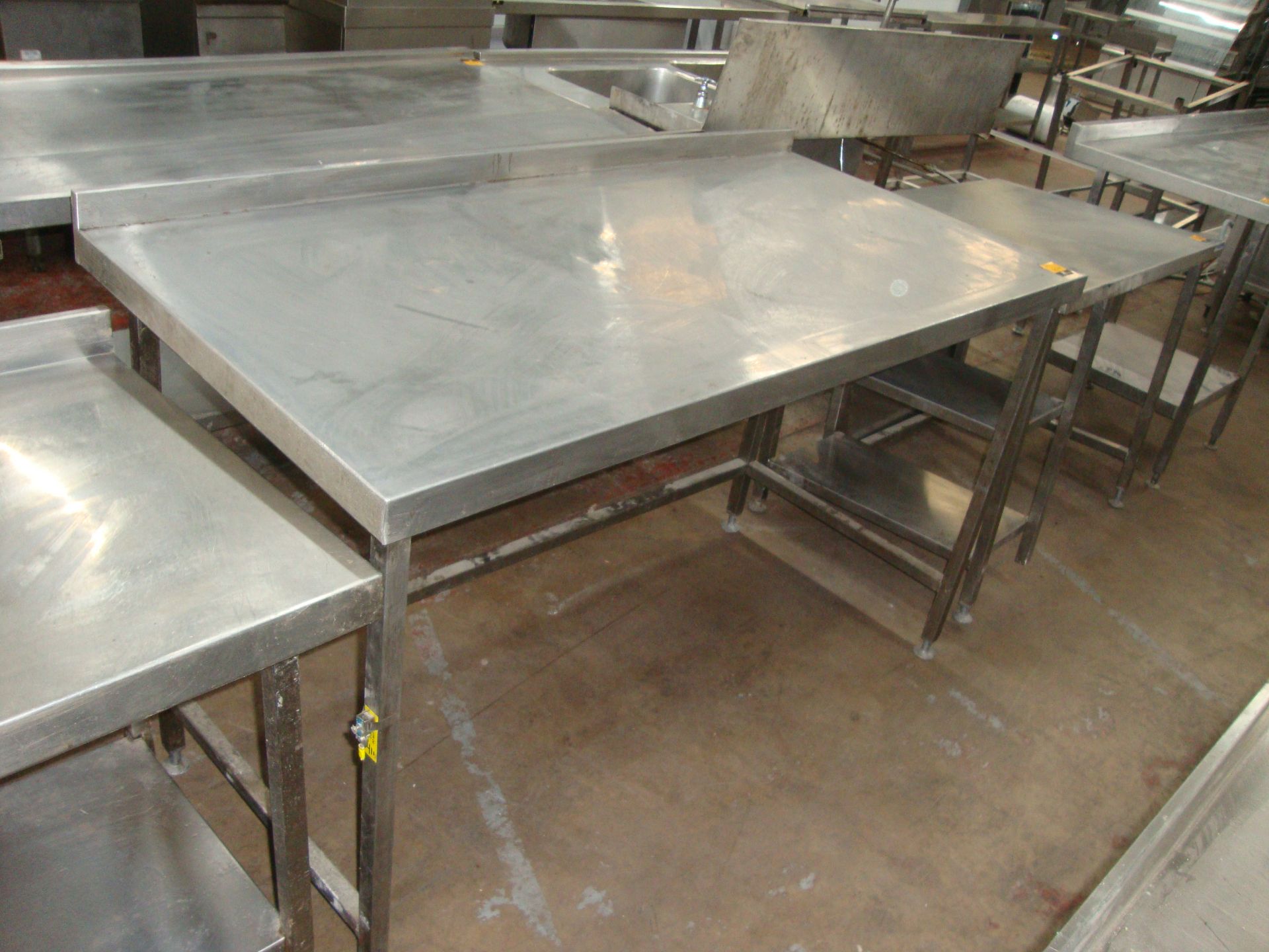 Stainless steel table with splashback circa 1550mm x 755mmIMPORTANT: Please remember goods - Image 2 of 2