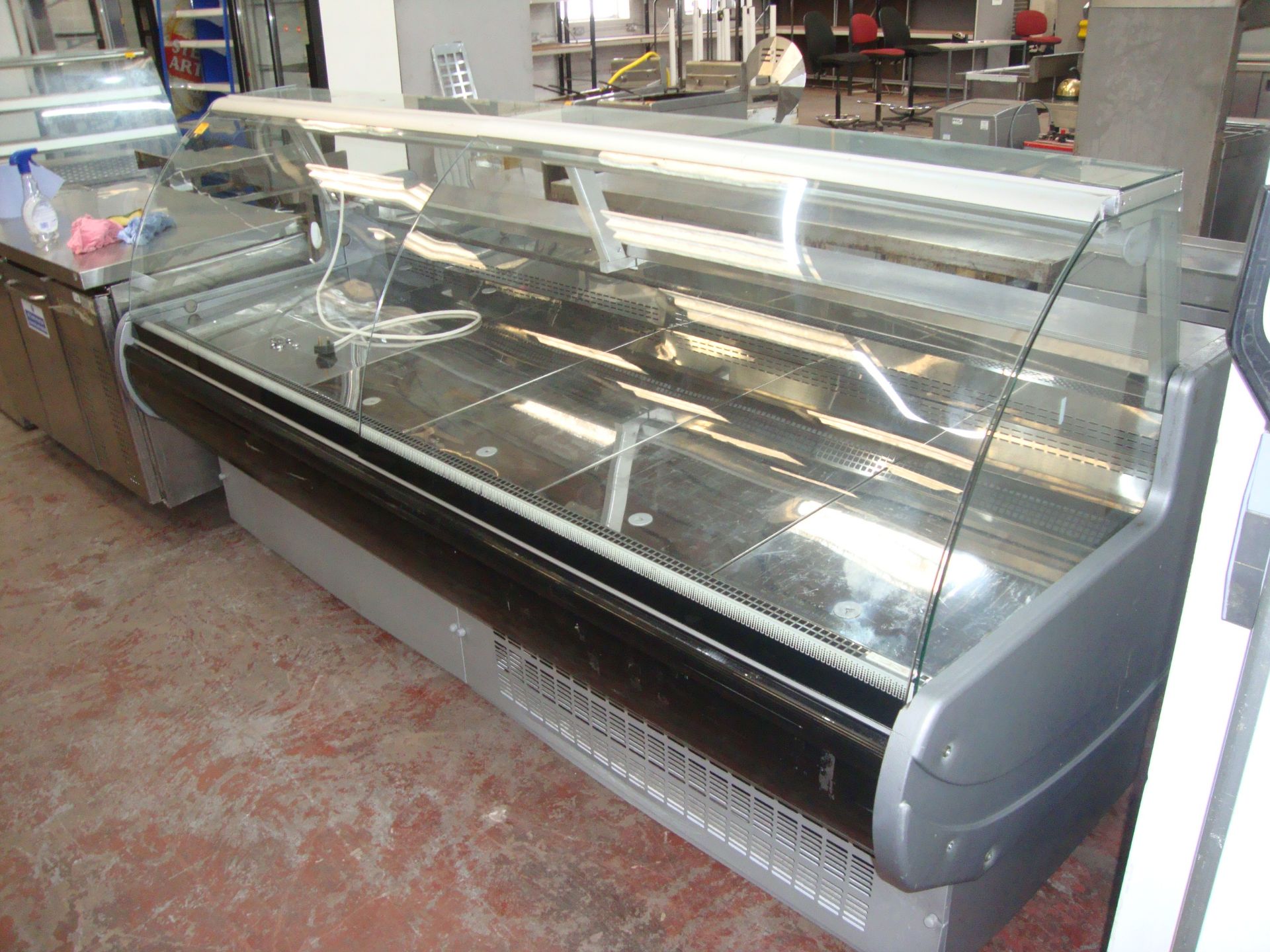 Large stainless steel and curved glass front display fridgeIMPORTANT: Please remember goods