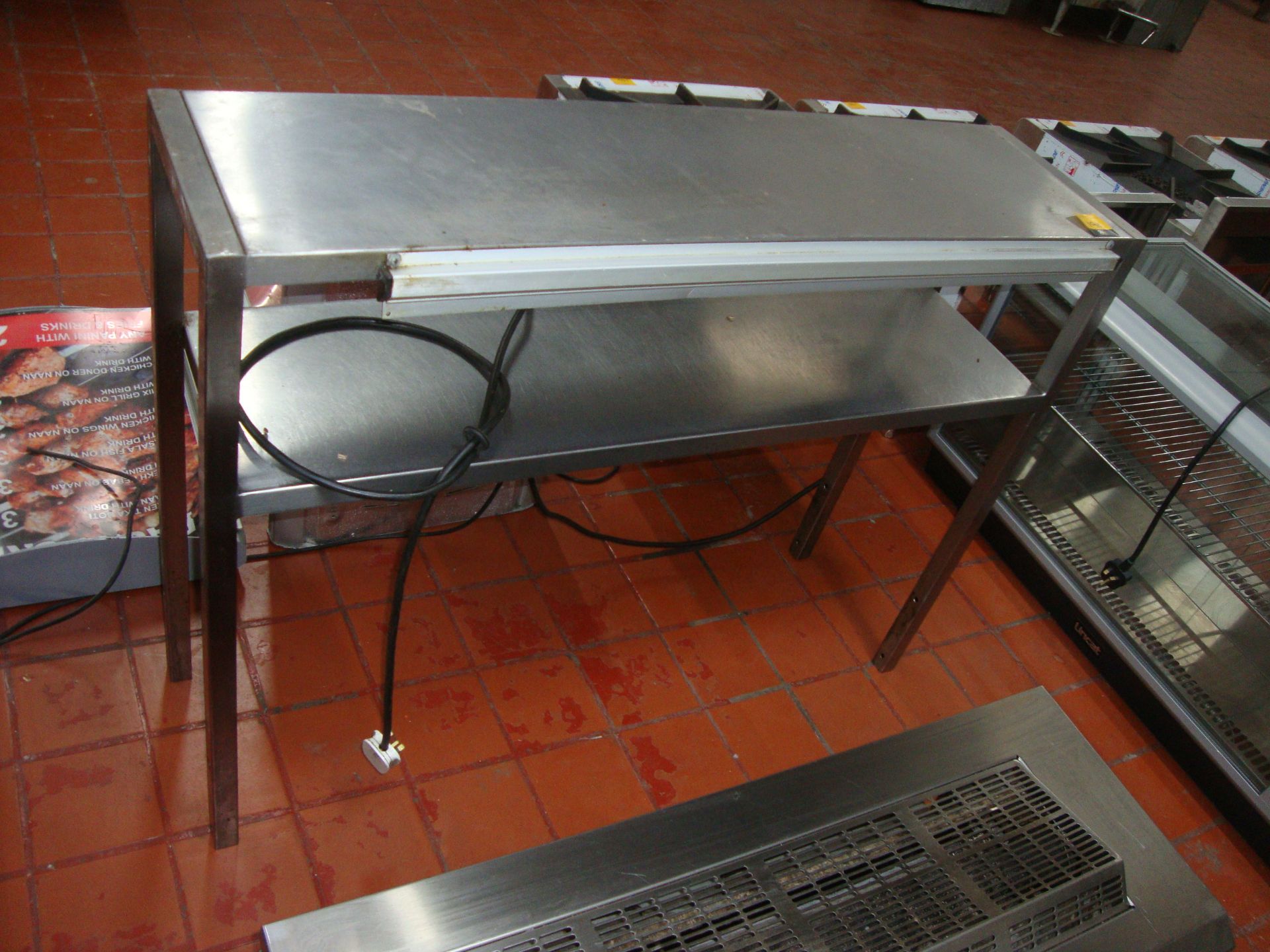 Stainless steel twin shelving unit with lighting underneath for attaching to the top of a table