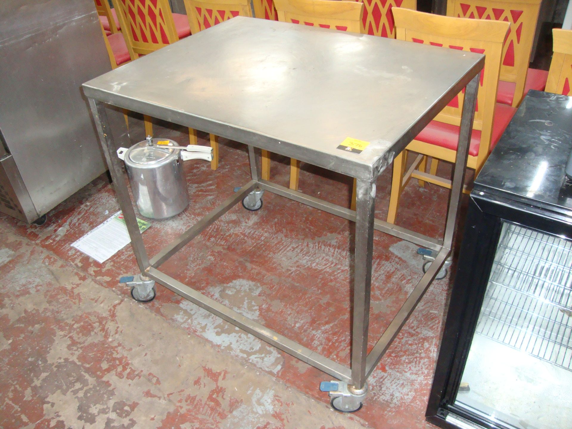 Mobile stainless steel tableIMPORTANT: Please remember goods successfully bid upon must be paid