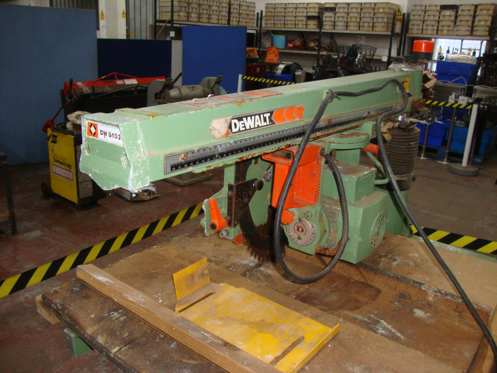 DeWalt overhead cross cut saw model DW8103, including dedicated workbench upon which it is mounted - Image 2 of 5