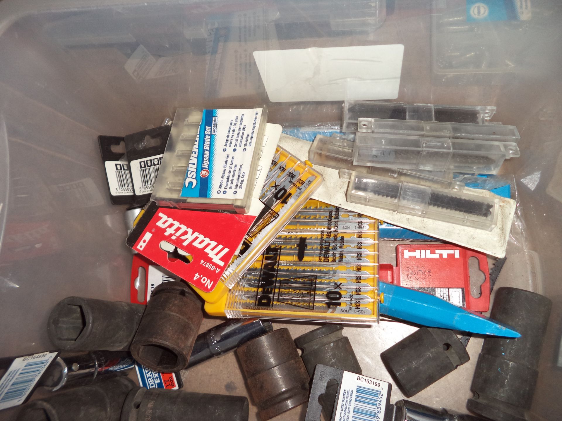 The contents of a crate of assorted sockets, jigsaw blades & other consumables IMPORTANT: Please - Image 3 of 3