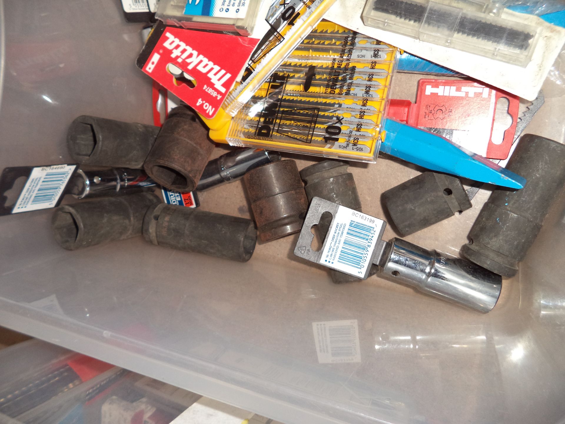 The contents of a crate of assorted sockets, jigsaw blades & other consumables IMPORTANT: Please - Image 2 of 3