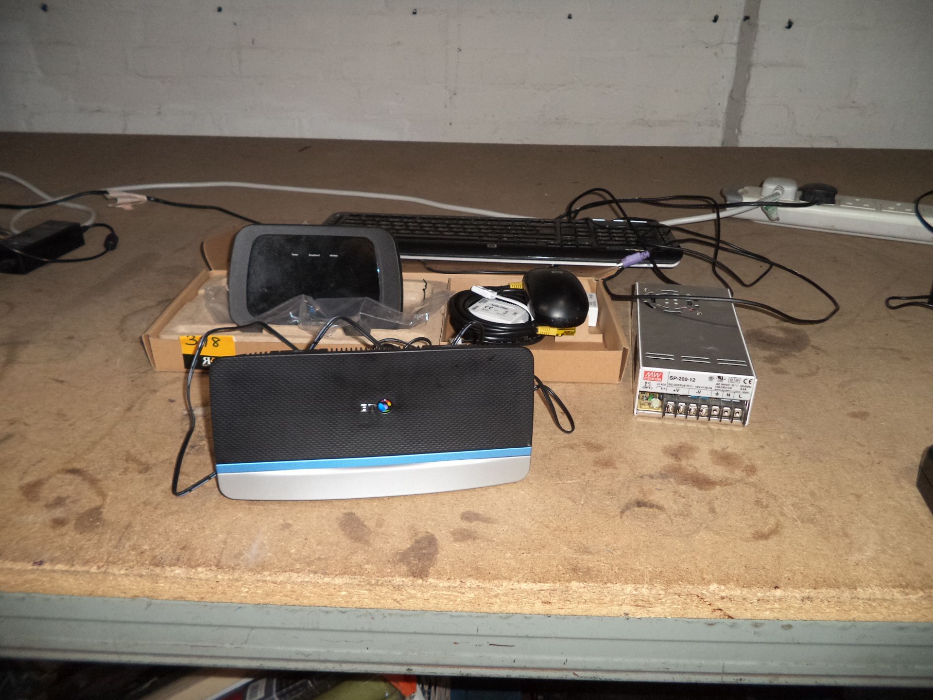 Assorted networking items comprising wireless equipment, keyboard, mouse, power supply, etc