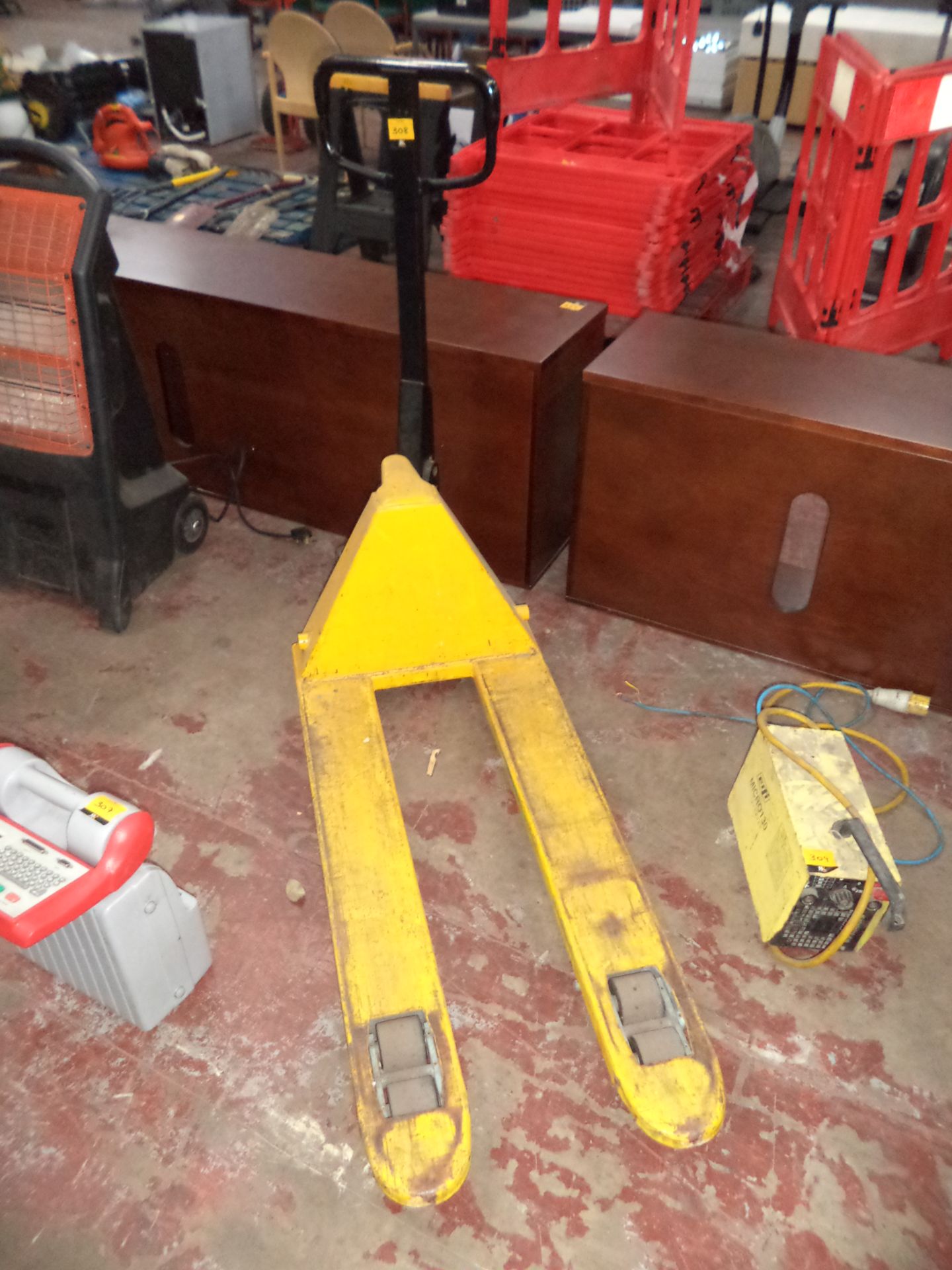 Euro pallet truck with twin wheels at the front of each fork IMPORTANT: Please remember goods