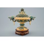 A Chinese polychrome ivory censer with cover on wooden base, 19th C. - H.: 18,5 cm -