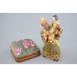 A Japanese enameled brass Ando Jubei box with cover and a large Satsuma figure, 19th [...]