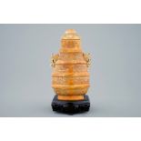 A Chinese parcel-gilt ivory vase and cover on wooden stand, 19th C. - H.: 21 cm -