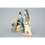 A Chinese polychrome carved ivory group of a lady with children, 19/20th C. - H.: [...]