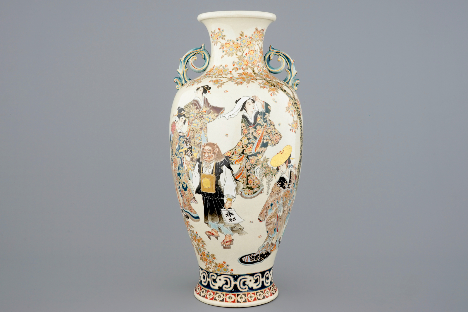 A tall figurative Japanese Satsuma vase, Meiji, 19th C. H.: 55 cm - Dia.: 26 cm Condition reports