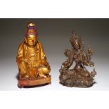 A Chinese bronze figure of Green Tara and a gilt wooden Guanyin, 19th C. Dim.: 24 x 13 x 12 cm (