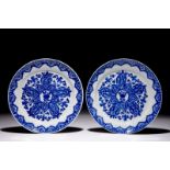 A pair of Chinese blue and white plates after Dutch Delft examples, Kangxi Dia.: 23,5 cm Condition