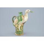 A Chinese verte biscuit crane-shaped ewer, 18/19th C. H.: 25 cm Condition reports and high