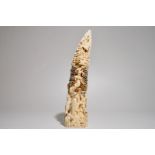 A Chinese carved ivory tusk with a marriage scene, ca. 1900 Dim.: 41 x 12,5 x 8 cm Condition reports