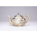 An inscribed Chinese silver teapot with dragon design, ca. 1936 L.: 24 cm - W.: 14 cm - H.: