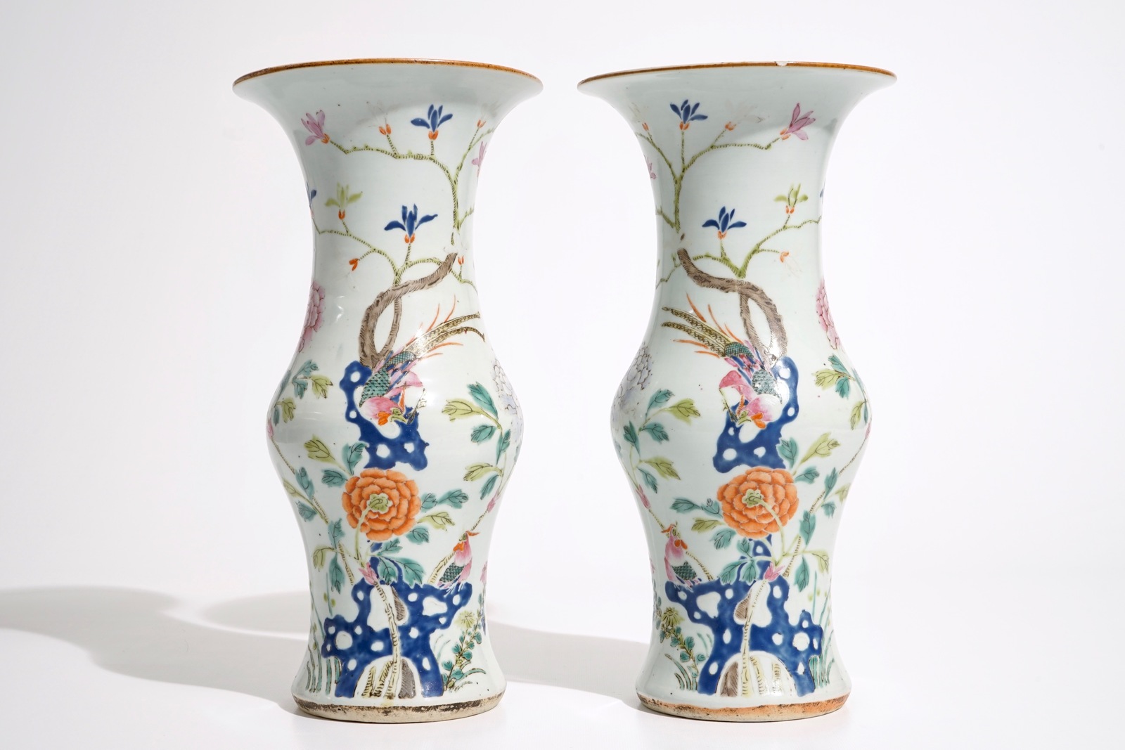 A pair of Chinese famille rose yenyen vases with pheasants, 19th C. H.: 37 cm Condition reports
