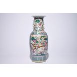 A Chinese famille rose vase with warriors on horseback, 19th C. H.: 62 cm Condition reports and high