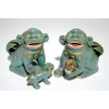 A pair of large Chinese buddhist lions with robin's egg glaze, 19th C. Dim.: 27 x 23 x 14,5 cm