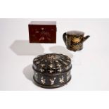 Two Japanese lacquer and mother of pearl boxes and a teapot, Meiji, 19/20th C. Dim.: 34 x 34 x 22,