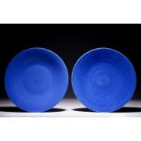 A pair of Chinese blue monochrome dishes, 19th C. Dia.: 28 cm Condition reports and high