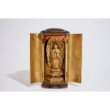 A Japanese lacquered and gilt wood "Zushi" shrine with a standing Buddha on a lotus throne, Edo,