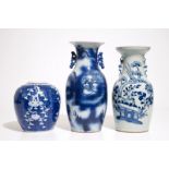 A Chinese blue and white dragon vase, a floral vase and a ginger jar, 19th C. H.: 44 cm (the