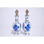 A pair of Chinese blue and white silver-mounted vases with long Eliza, Kangxi H.: 17 cm (inc. cover)