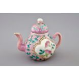 An unusual Chinese pink ground miniature teapot and cover, 19th C. H.: 7 cm Condition reports and