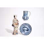 A blue and white Arita jug and a plate, 17/18th C., with an Imari figure, 18/19th C. H.: 37 cm (