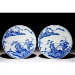 A fine pair of round Chinese blue and white landscape plaques, Kangxi Dia.: 25 cm Condition