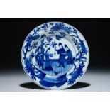 A Chinese blue and white plate depicting the sense of smell, Kangxi Dia.: 15 cm A small Kangxi