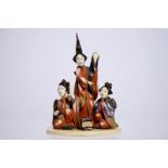 A polychrome Japanese ivory okimono of ladies presenting a gift, Meiji, early 20th C. Dim.: 19,5 (h)