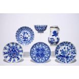 A Chinese blue and white silver-mounted jug and cover, a cup and saucer and three saucer plates,