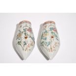 A pair of Chinese famille rose wall pocket vases, 18/19th C. H.: 18 cm Condition reports and high