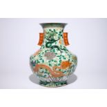 A large Chinese famille verte hu-shaped "Dragon" vase, 19th C. H.: 49 cm Condition reports and