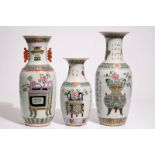 Three Chinese famille rose and verte vases with incense burners and jardinieres, 19th C. H.: 60,5 cm