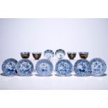 Six Chinese blue and white on capucin brown ground cups and saucers, Kangxi Dia.: 13,5 cm (saucer)