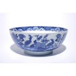 A large Chinese blue and white bowl with birds among blossoming flowers, Qianlong Dia.: 40 cm -